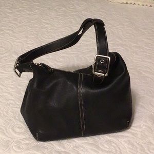 Woman’s black bag